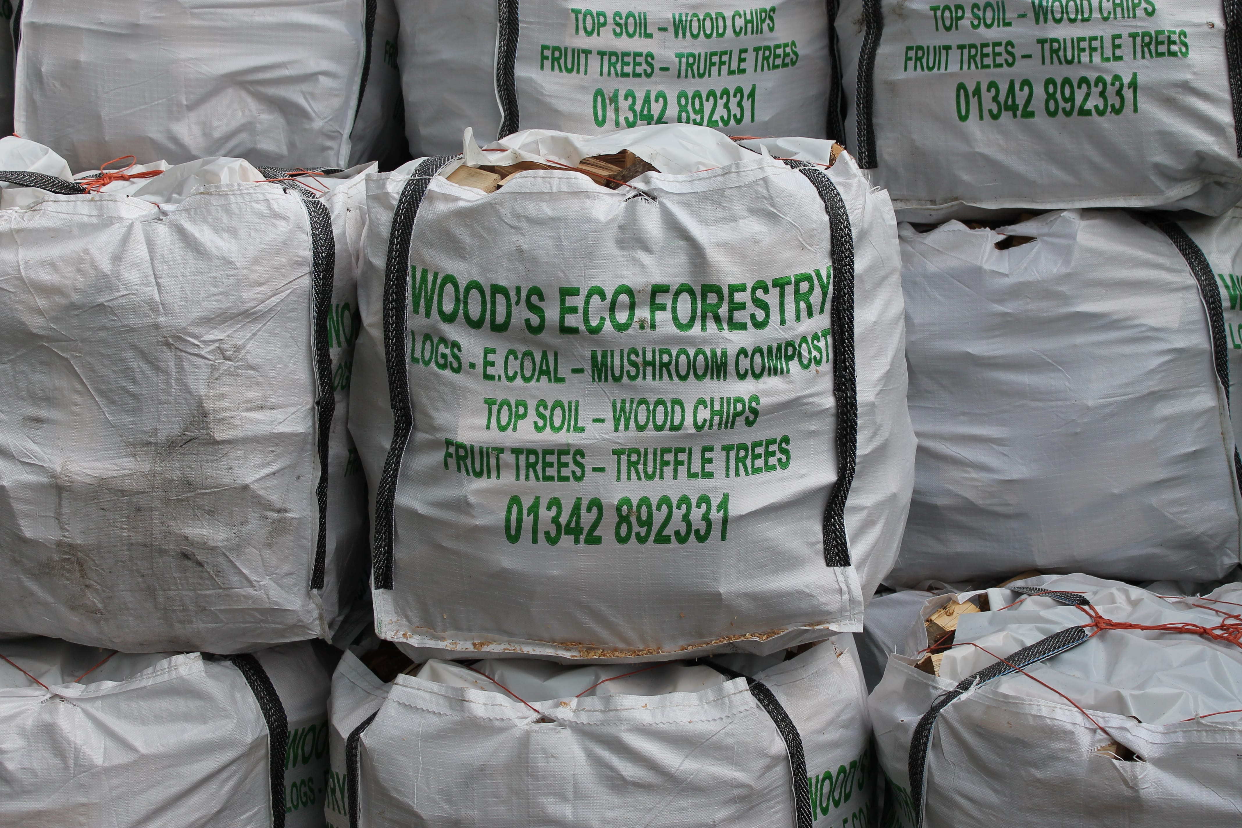 Seasoned hardwood logs ready for local delivery